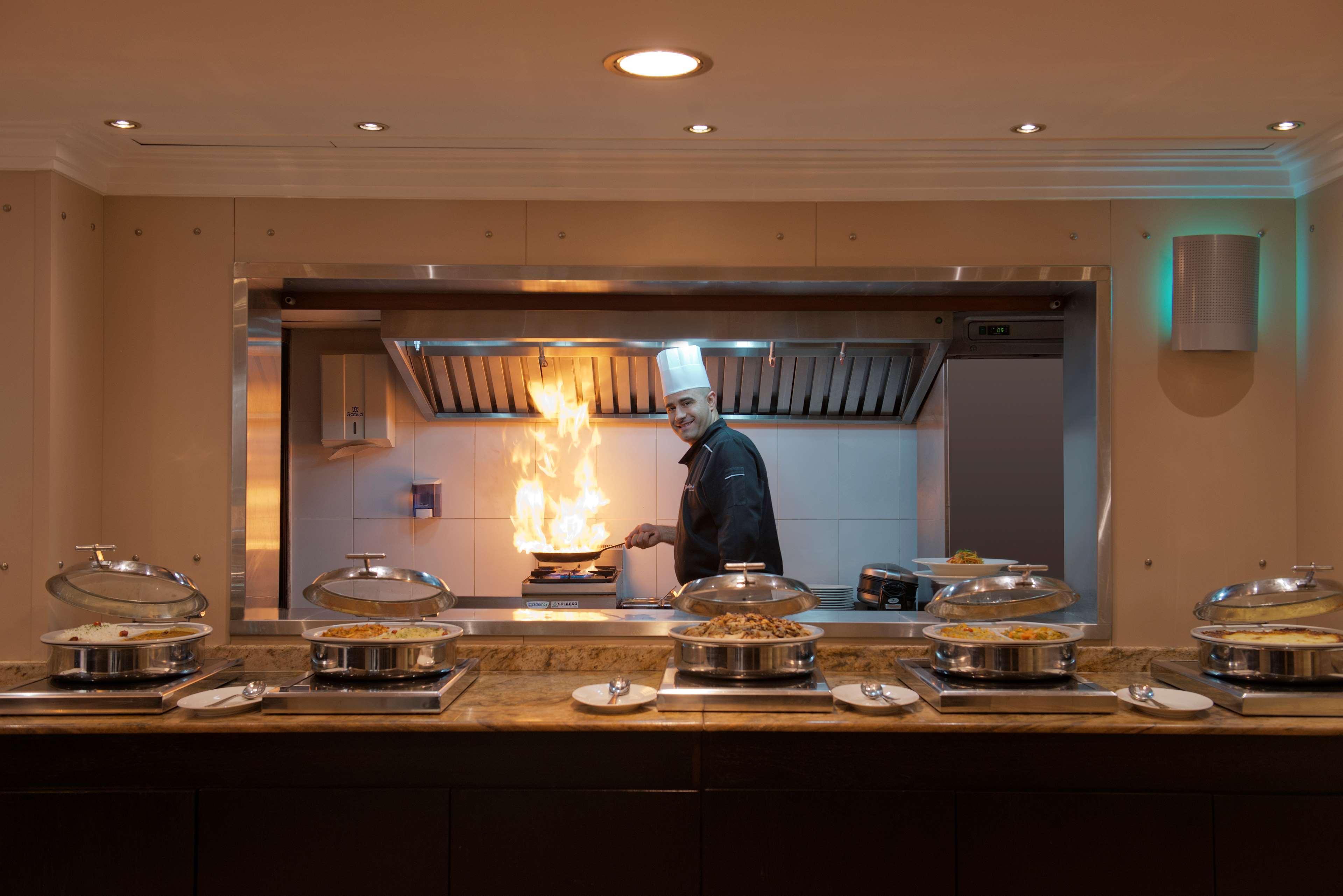 Radisson Blu Martinez Beirut Hotel Bagian luar foto A live kitchen at a hotel