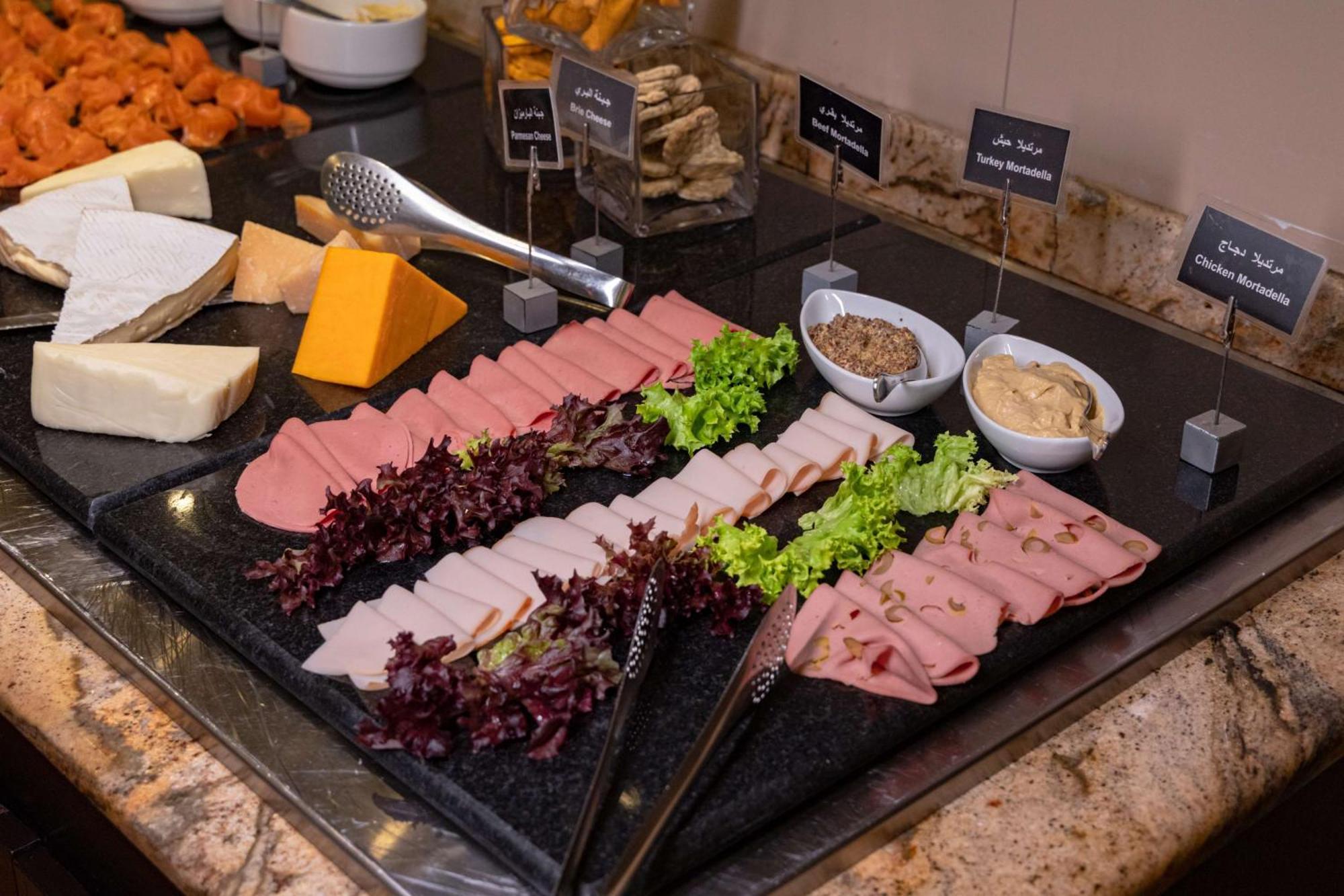 Radisson Blu Martinez Beirut Hotel Bagian luar foto A selection of cold cuts