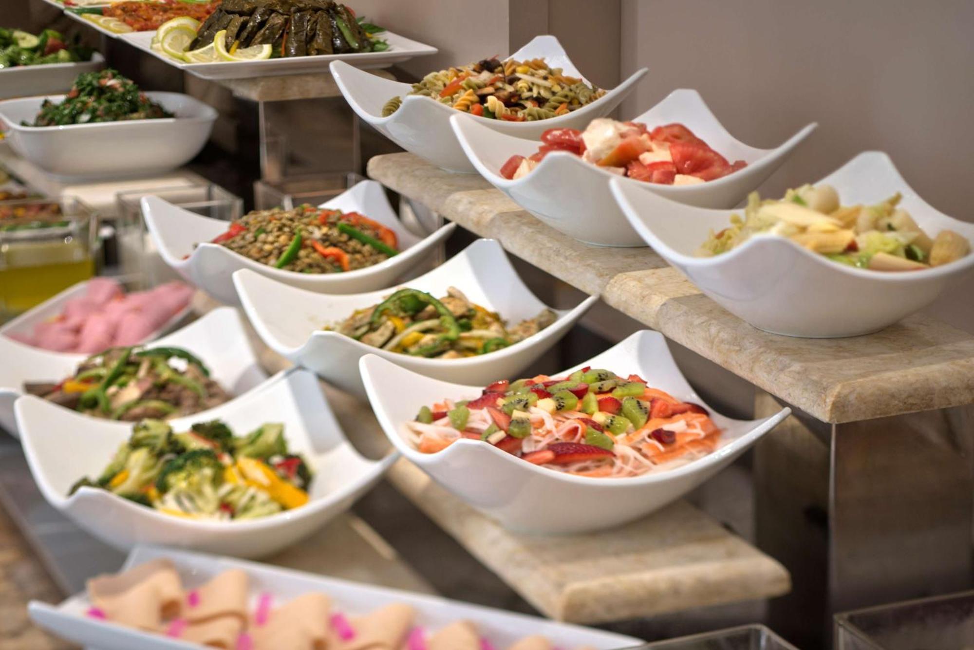 Radisson Blu Martinez Beirut Hotel Bagian luar foto A selection of salads